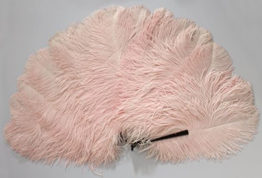 Folding fan of pink ostrich feathers on a frame of artificial tortoiseshell with matching hook and copper pin