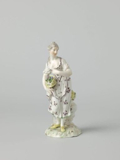 Figure of a woman with a flower basket
