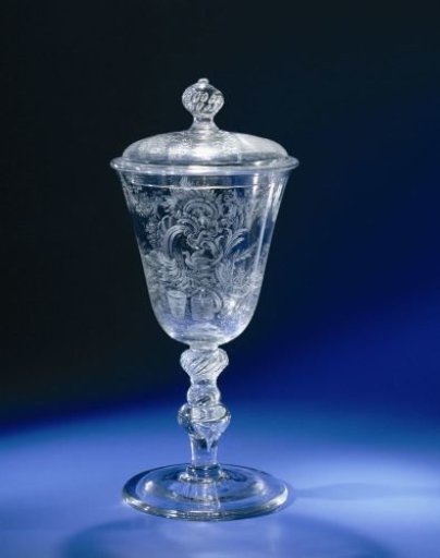 Beaker with lid, featuring a dove and equipment for distilling drinks (?)