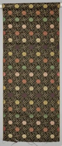 Piece of silk with a design of swastikas set in a "diamond" of cloud bands with circular flowers at the intersections of the diamond