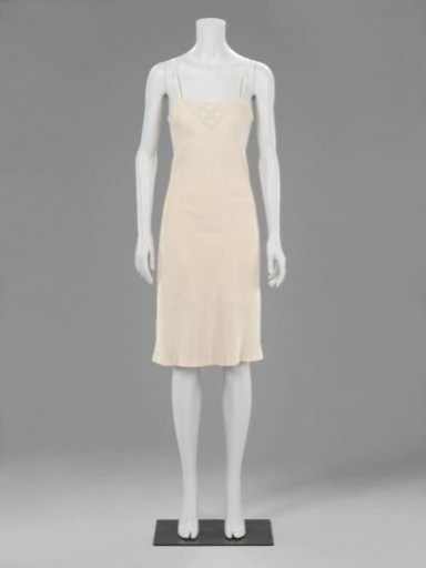 Salmon-colored silk underdress with spaghetti straps and filet decoration