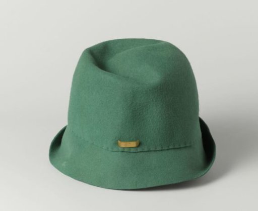 Cloche of green felt with a small clip of yellow copper