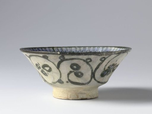 Bowl with pseudo-inscription and scrolls