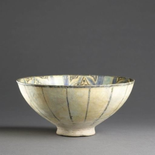 Bowl with petal-shaped panels with floral scrolls