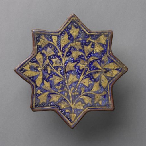 Star-shaped tile with a stylized flowering plant