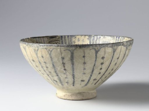 Bowl with a stylized scrolls and geometrical patterns
