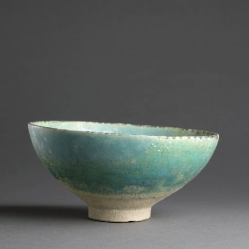 Bowl with a floral roundel among fish