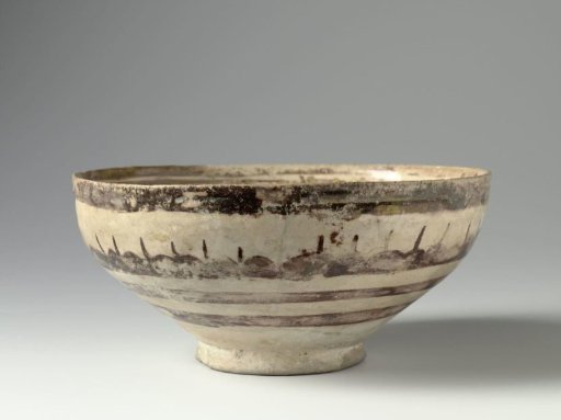Bowl with a border of horsemen and an inscription
