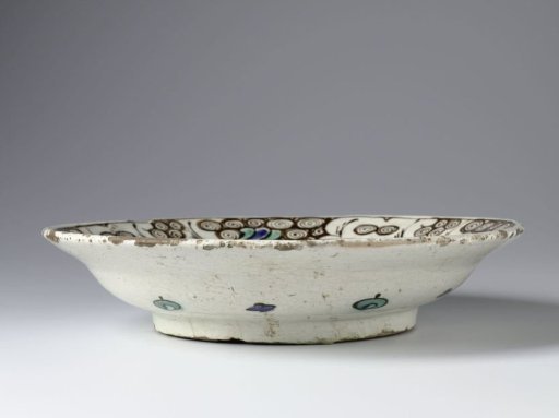 Dish with flowering plants and scrolls