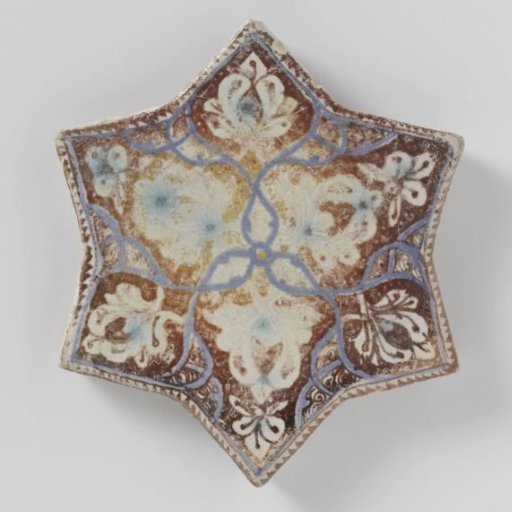 Star-shaped tile with floral scrolls