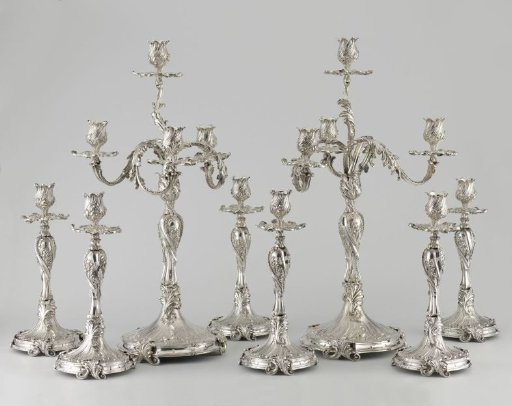 Ensemble of two candelabra, six candlesticks, and a central piece, with accompanying liber amicorum