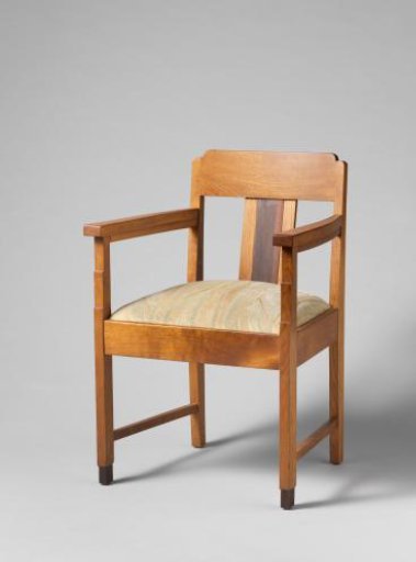 Armchair with a dark back panel
