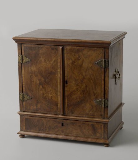 Coin cabinet with two doors, behind which are ten drawers, one drawer, and a flap