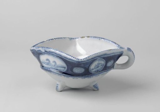 Test of faience, painted with medallions depicting landscapes