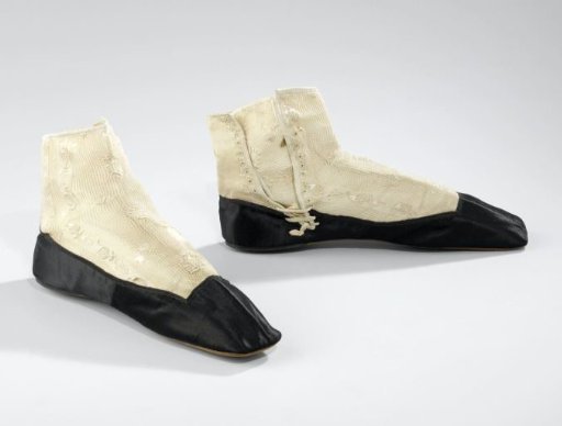 Pair of Ankle Boots with a Shoe