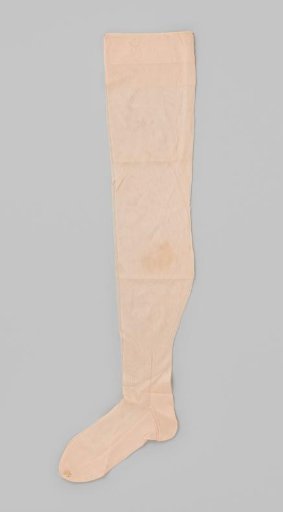 Long lady's stocking of pink silk tricot with 'FEE' woven into the border and a long stem with a stylized flower on the heels