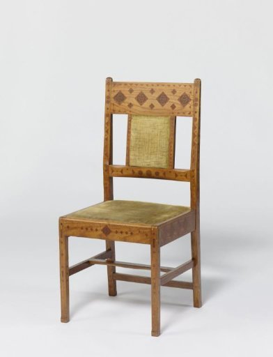 Chair of rosewood, decorated with engraved patterns and inlaid with a tropical wood