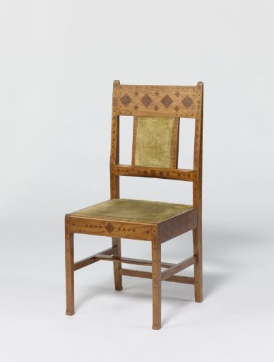 Chair of rosewood, decorated with engraved patterns and inlaid with a tropical wood