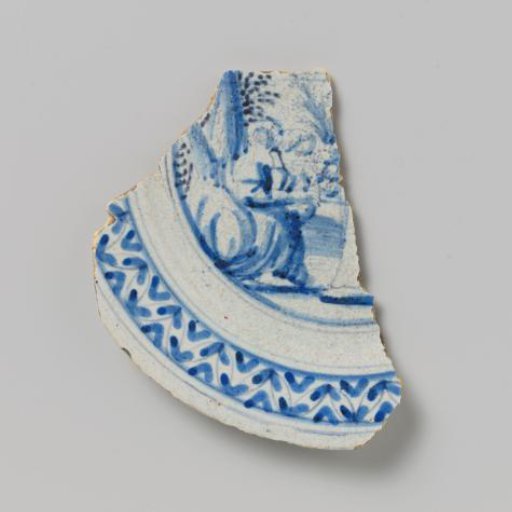 Fragment of a plate, painted with an indistinct representation