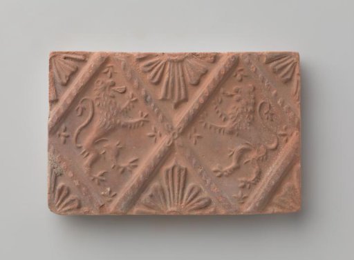 Fireplace with a Depiction of Two Climbing Lions