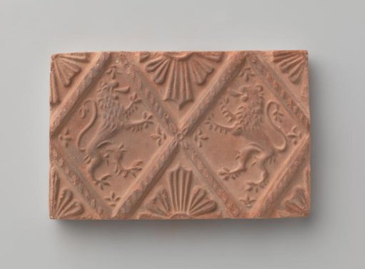 Fireplace with a Depiction of Two Climbing Lions