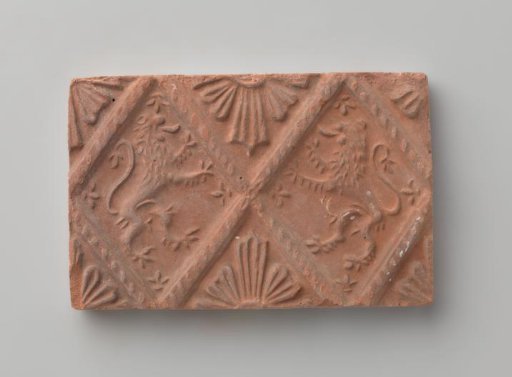 Fireplace with a Depiction of Two Climbing Lions