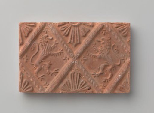 Fireplace Tile Depicting Two Climbing Lions