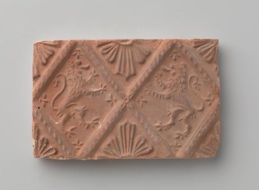 Fireplace Tile Depicting Two Climbing Lions
