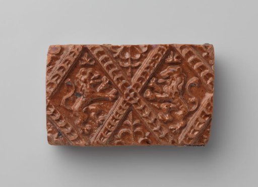 Fireplace with a Depiction of Two Climbing Lions