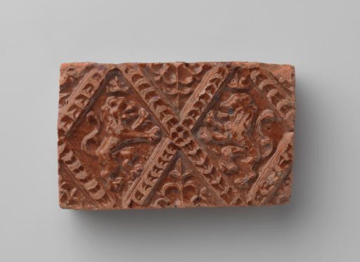 Fireplace with a Depiction of Two Climbing Lions