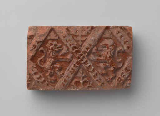 Fireplace with a Depiction of Two Climbing Lions