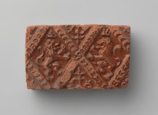 Fireplace with a Depiction of Two Climbing Lions