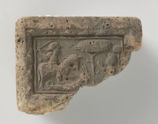 Fireplace with a depiction of Saint George on horseback slaying the dragon