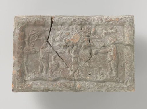 Fireplace with a depiction of Adam and Eve in Paradise