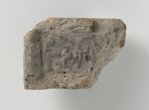 Fireplace with a depiction of Christ on the cross with the three Marys
