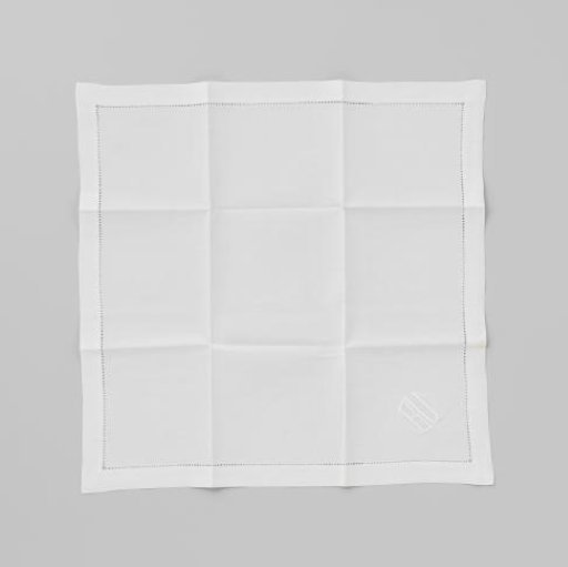 Linen napkin with the embroidered initials BU