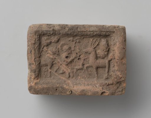 Fireplace with a depiction of Saint Hubertus kneeling before the stag with the cross between the antlers