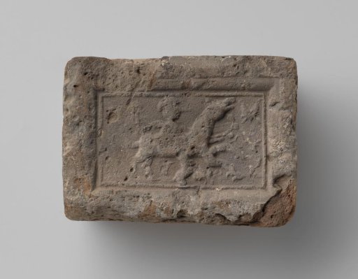 Fireplace with a representation of a rider