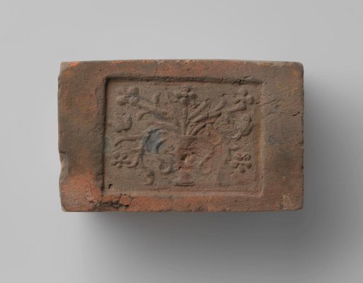 Fireplace with a Representation of a Vase with Flowers
