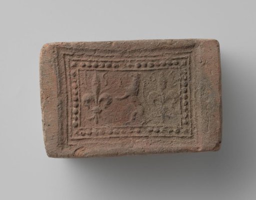 Fireplace with a Representation of a Climbing Lion Flanked by Two French Lilies