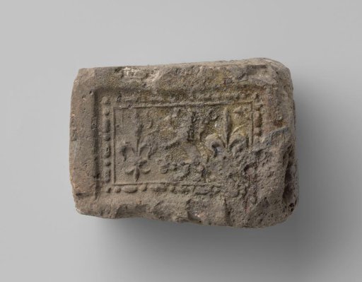 Fireplace with a Representation of a Climbing Lion Flanked by Two French Lilies