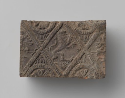 Fireplace with a climbing lion