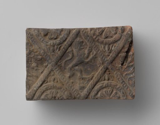Fireplace with a climbing lion