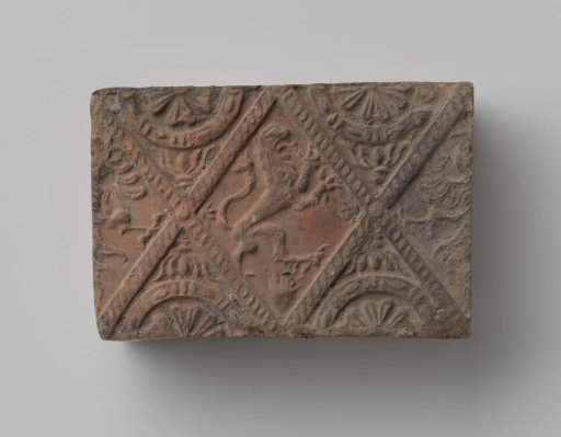 Fireplace with a Climbing Lion