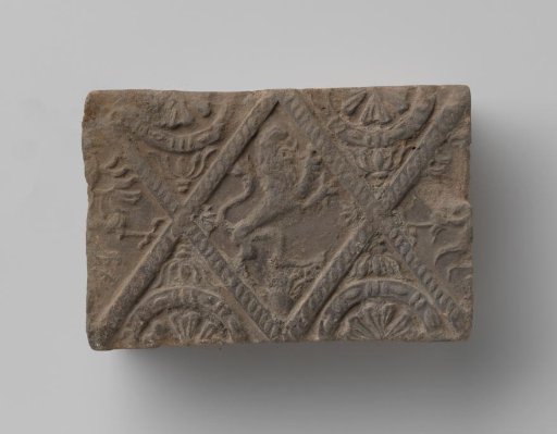 Fireplace with a climbing lion