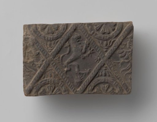 Fireplace with a climbing lion