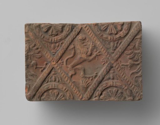 Fireplace with a climbing lion