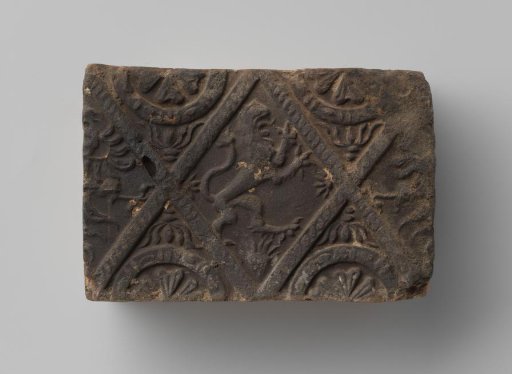 Fireplace with a Climbing Lion