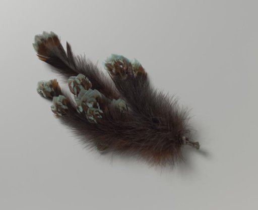 Tuft of hat feathers in brown and turquoise
