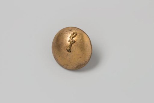 Copper button, smooth, with a key-shaped symbol attached from the center